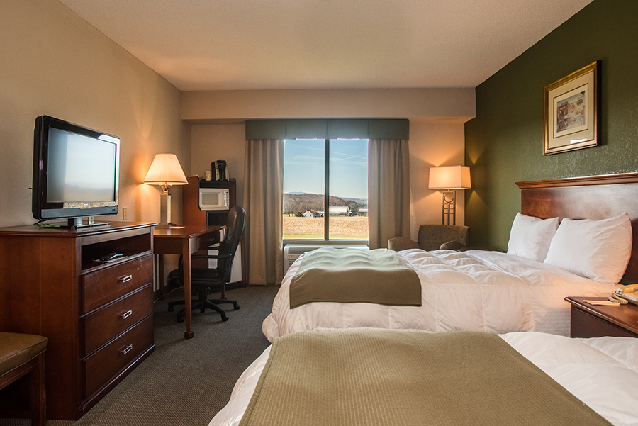 room with two queen beds at Round Hill Inn Orange Virginia